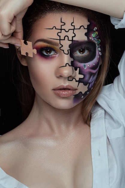 Beautiful woman with skeleton make up