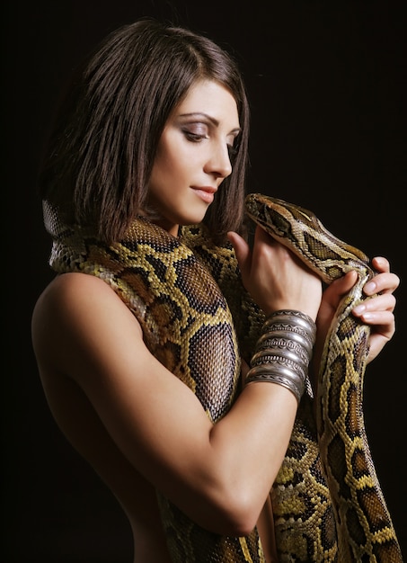 Beautiful woman with a snake