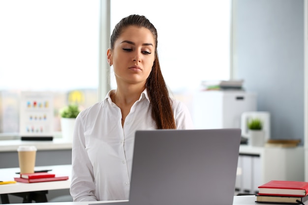 Beautiful woman working on a laptop