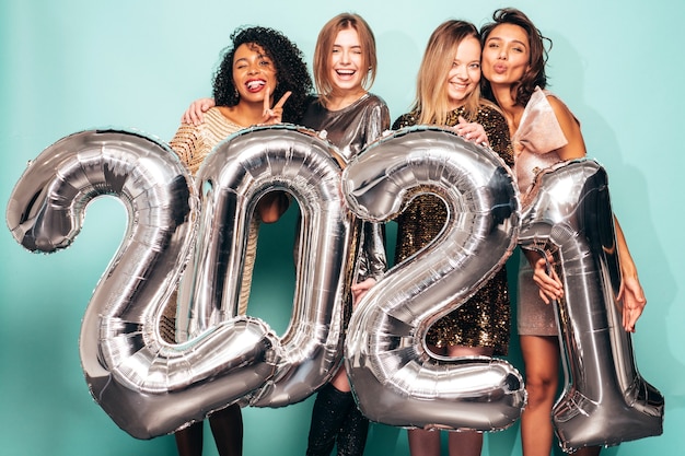 Beautiful Women Celebrating New Year.Happy Gorgeous Female In Stylish 