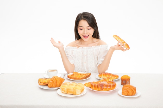 Beautiful women eating bread