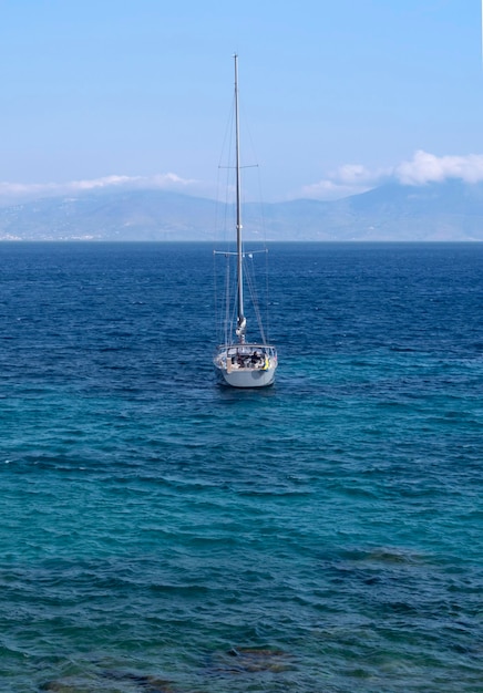 Beautiful yacht on the calm Aegean Sea on Mykonos island in Greece