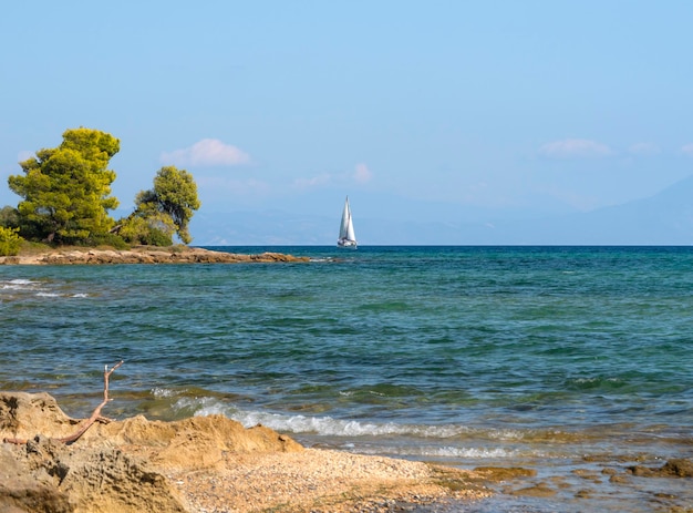 Beautiful yacht on a sunny day on the calm Aegean Sea on the island of Evia, Greece