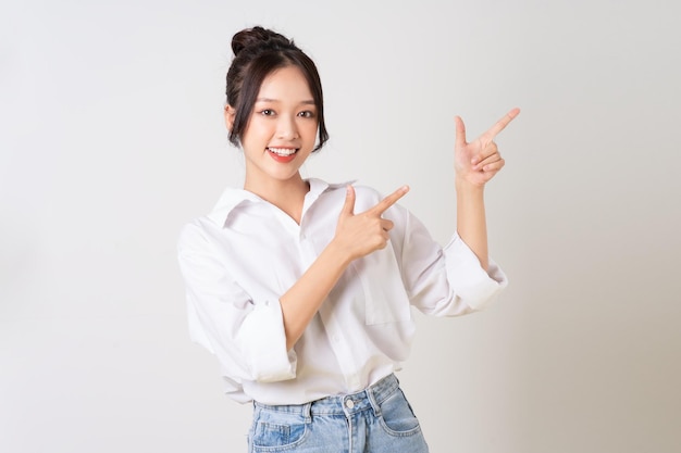 Beautiful young asian businesswoman portrait on white background