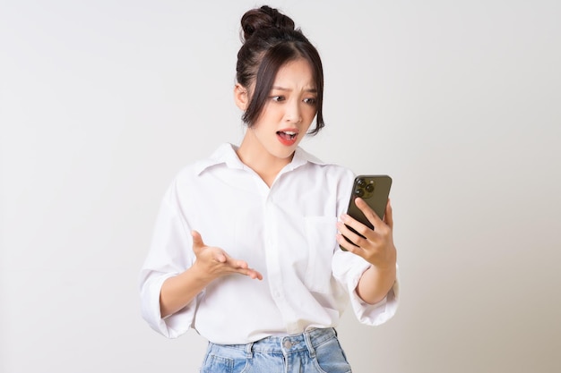 Beautiful young asian businesswoman portrait on white background