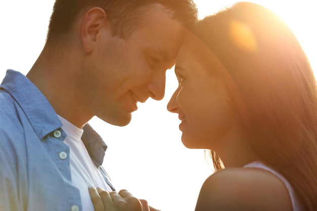 Beautiful young couple on sunny day outdoor