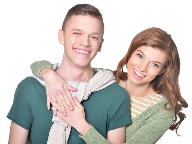 Beautiful young couple on a white background