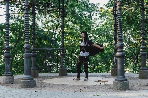 Beautiful young girl dressed in style steampunk