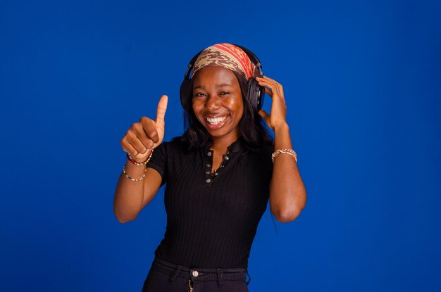 Beautiful young girl listening music