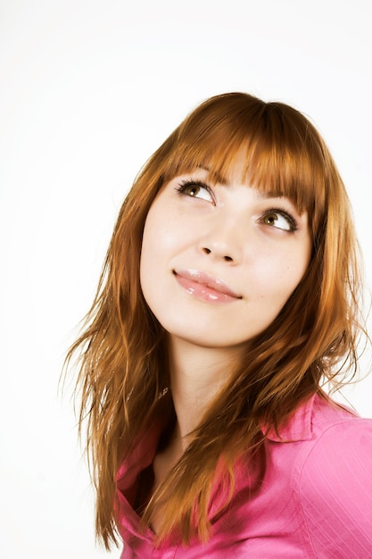 Beautiful young girl with red hair