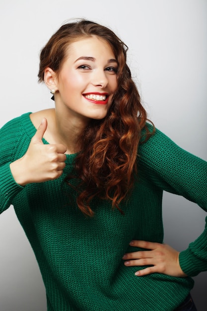 Beautiful young surprised woman Studio shot