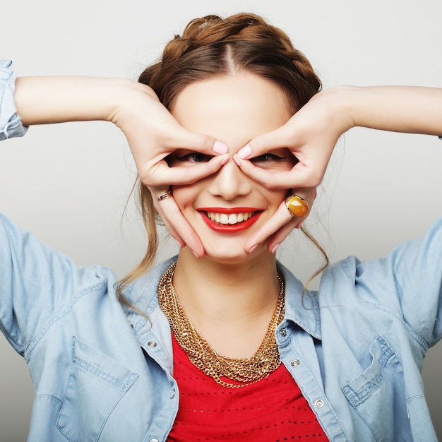 Beautiful young surprised woman