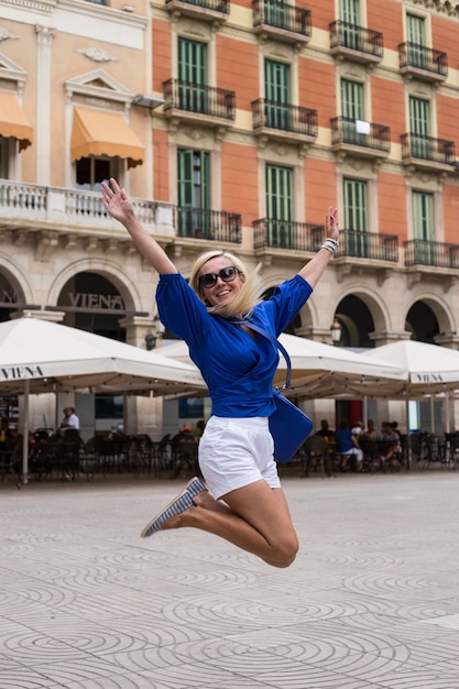 Beautiful young tourist in the old town