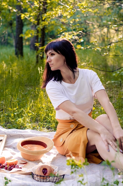 Beautiful young woman at a picnic