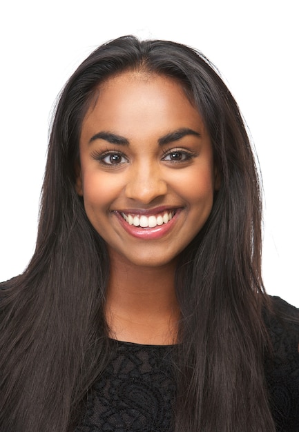 Beautiful young woman smiling on isolated white background