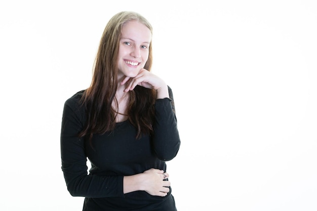 Beautiful young woman smiling pensive looking portrait charming cute smile while posing against white copy space background