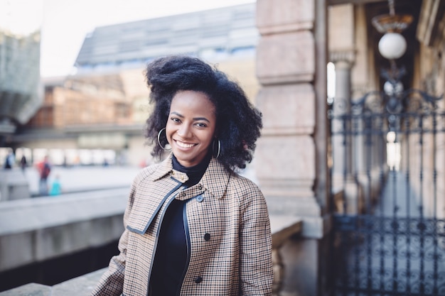 Beautiful young woman at the street