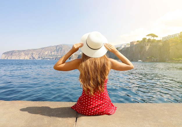 Beautiful young woman in the village of Sorrento, Italy