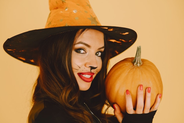 Beautiful young woman with cat makeup