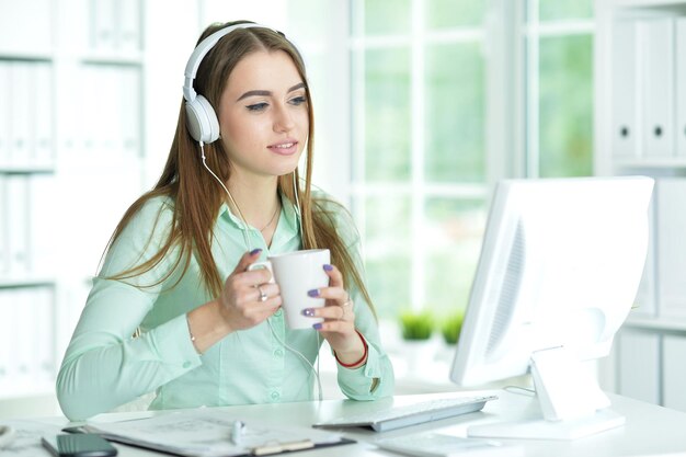 Beautiful young woman with headphones