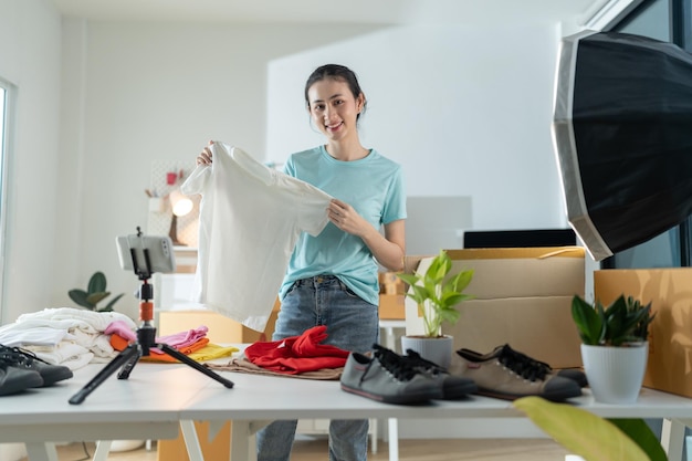 Beautiful young woman working at online store Wearing casual clothes