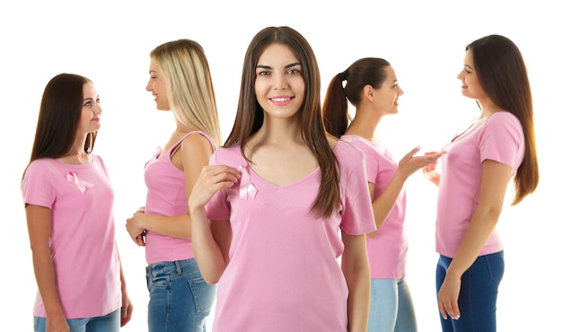 Beautiful young women in pink shirts on white background Breast cancer concept