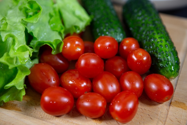 Beautifully laid out bright and delicious vegetables on a cutting Board