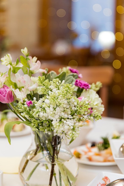 beautifully set tables with glasses and appliances for a wedding or other event