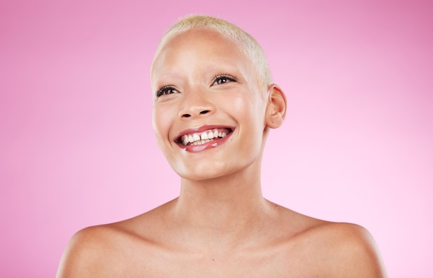 Beauty black woman and unique smile of a model with skincare wellness and happiness Isolated pink background and studio with a young person happy about cosmetics dermatology and facial detox