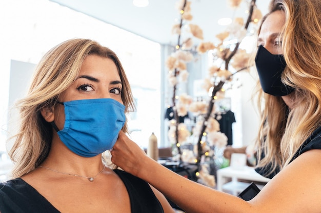 Beauty client looking at camera in a hairdresser