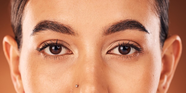 Beauty eyes and vision portrait of a woman in studio for cosmetics make up and dermatology with natural lashes and skin Zoom on aesthetic model with eye care focus and perfect eyebrow shape