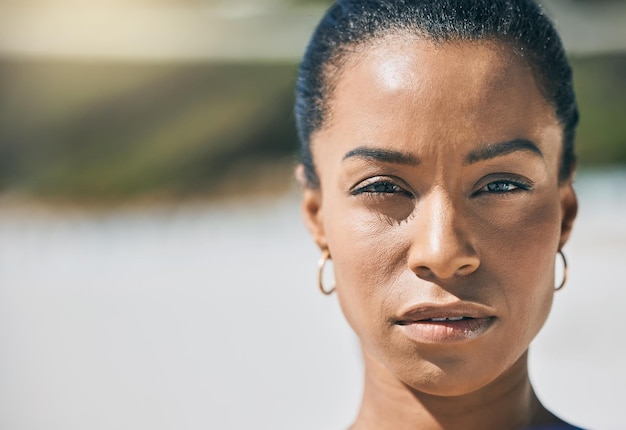 Beauty face and empowerment with a free black woman outdoor for freedom and human rights Skin portrait and proud with a young empowered female standing outside for justice hope and activism