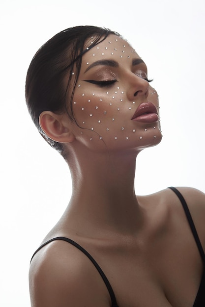 Beauty face woman makeup rhinestones lips Contrasting portrait of a beautiful woman wet hair styling Clean facial skin