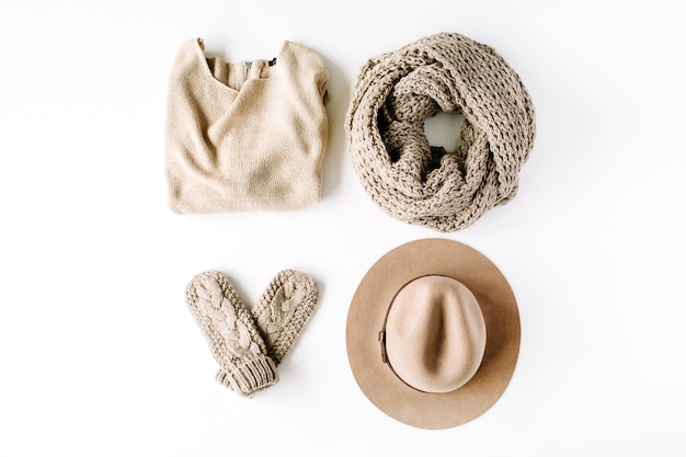 Beauty feminine clothes arrangement with hat, mittens, sweater, scarf.