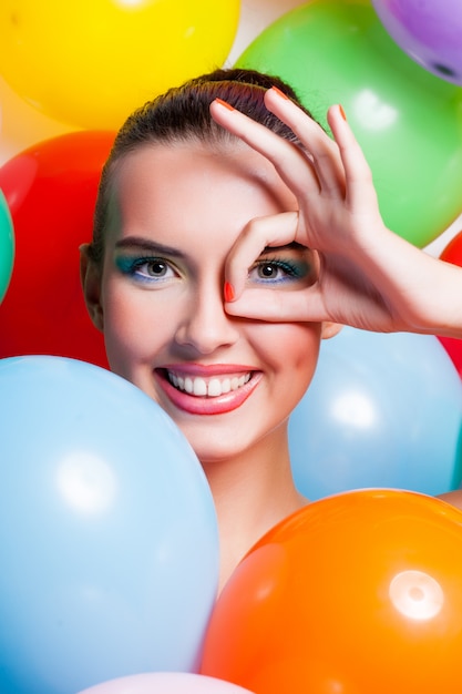 Beauty Girl Portrait with Colorful Makeup