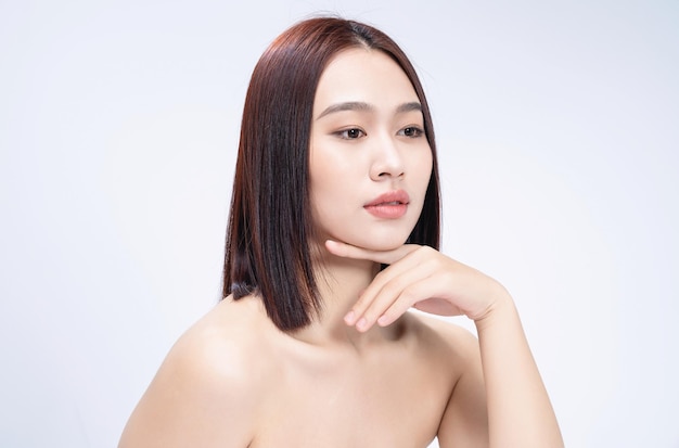 Beauty image of young Asian woman on white background