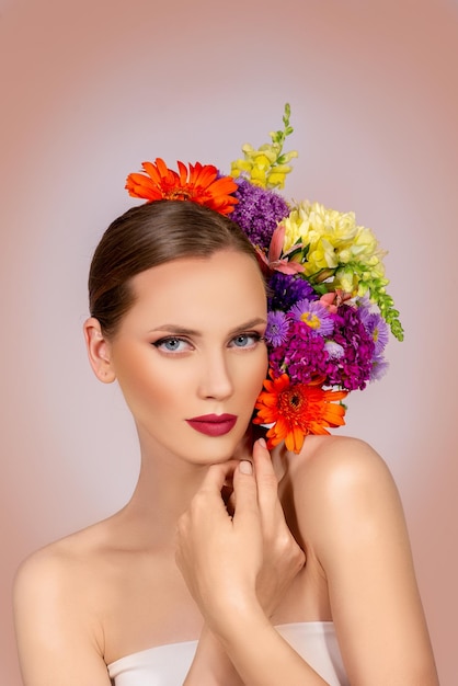 Beauty and make up fashion model portrait with blossom flowers