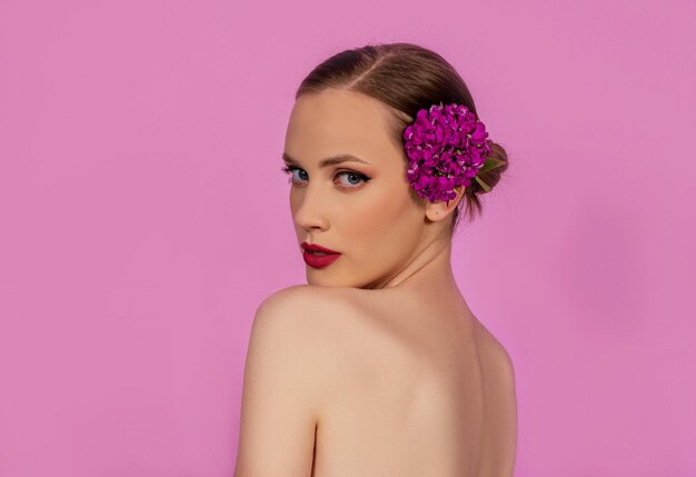 Beauty and make up fashion model portrait with blossom flowers