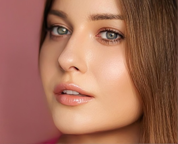 Beauty makeup and skincare cosmetics model face portrait on pink background beautiful woman with natural makeup perfect healthy skin glow facial care