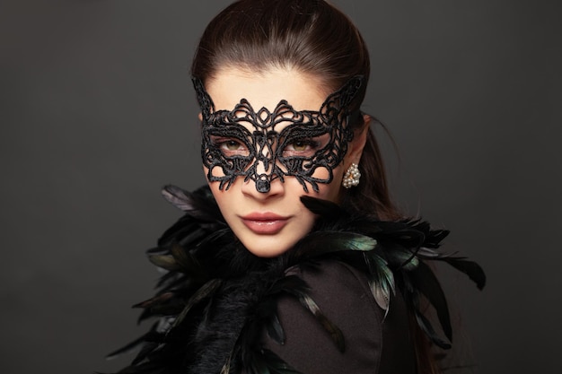 Photo beauty model woman with stylish black carnival mask glamorous beauty