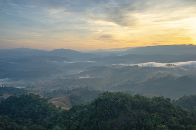 The beauty of mountain scenery with warm light in the morning.