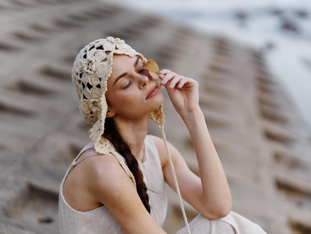 Photo beauty in nature a young and fashionable woman posing in a pretty summer dress with elegance and