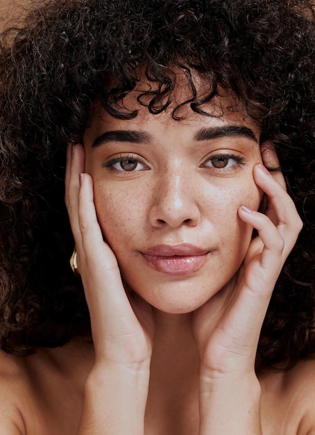 Beauty portrait and natural face of black woman with healthy freckle skin texture touch Aesthetic facial and skincare cosmetic model girl touching cheeks for self love and wellness