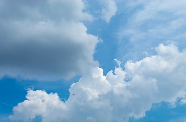 The beauty of the sky with clouds and the sun.