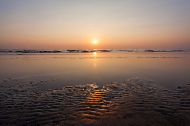 Beauty sunset on Goa beach in India