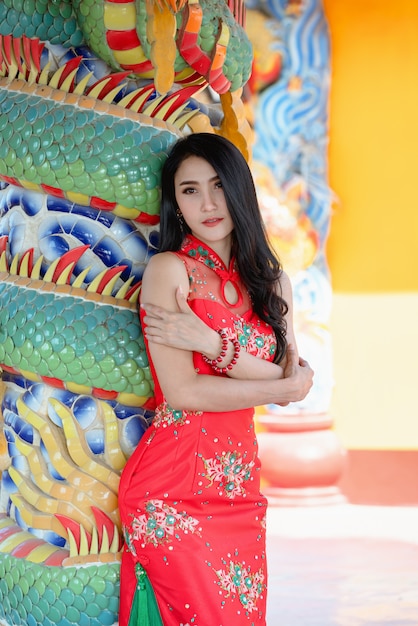 Beauty woman and hold shopping bags in chinese new year