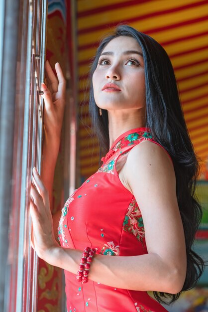 Beauty woman and hold shopping bags in chinese new year