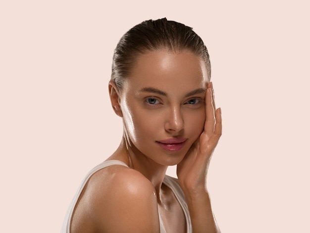 Beauty woman with hands healthy  natural make up clean fresh skin concept color background yellow