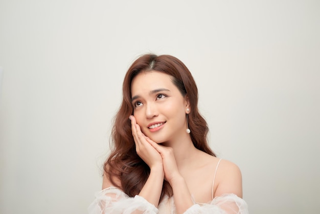 Beauty young woman in white dress