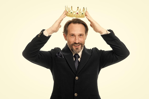 Photo become next king monarchy family traditions man nature bearded guy in suit hold golden crown symbol